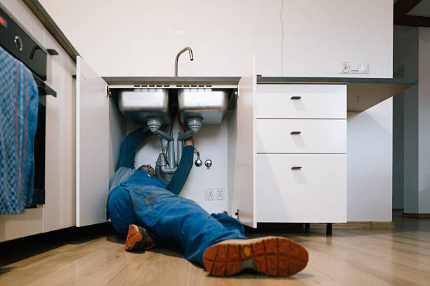Professional Drain Cleaning technician working in Martensdale, IA